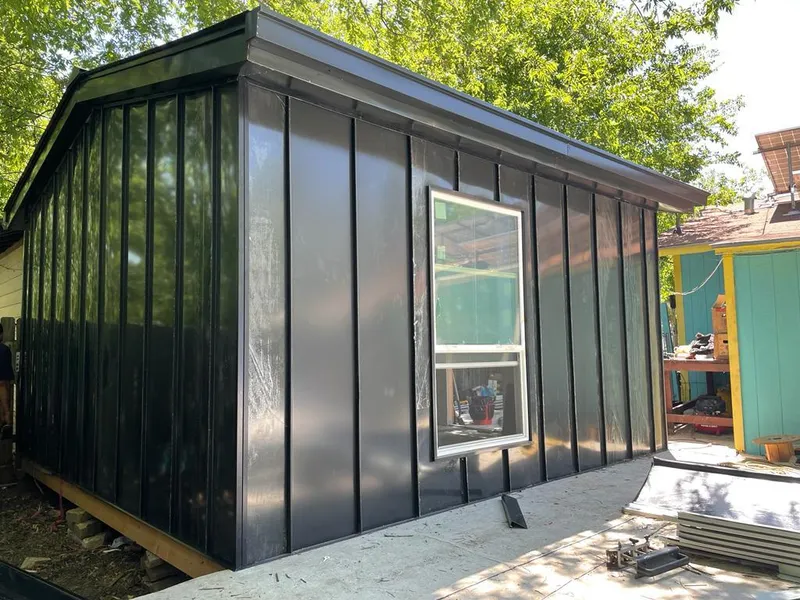 Black standing seam metal wall panels for Roof Inspection in Kanab